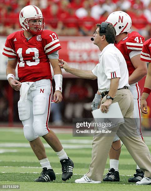 Quarterback Zac Taylor of the Nebraska Cornhuskers heads back onto the field after discussing options with head coach Bill Callahan during a timeout...