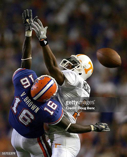 Cornerback Vernell Brown of the Florida Gators knocks away a pass intended for wide receiver Robert Meachem of the Tennessee Volunteers at Ben Hill...