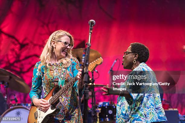 American musician Susan Tedeschi , on guitar, and guest vocalist Sharon Jones perform with the Tedeschi Trucks Band on opening night of the 30th...