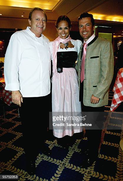 Lothar Matthaeus poses for a photo with his wife Marijana and Alfons Schubeck at the Arabella Sheraton Hotel on September 17, 2005 in Munich,...