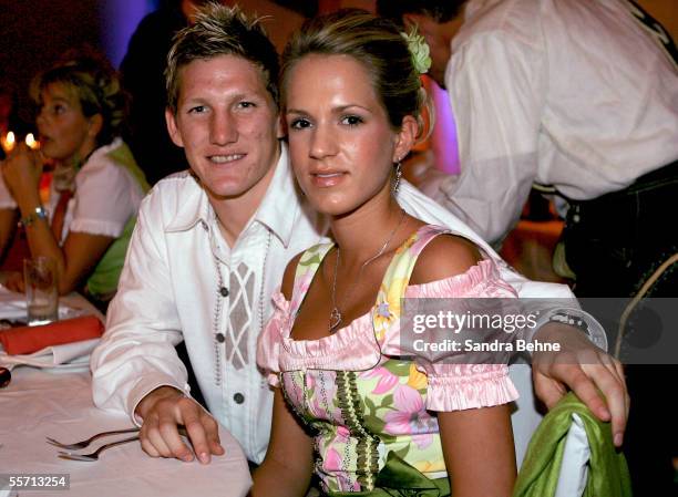 Bastian Schweinsteiger and his girlfriend Daniela Aumeier pose at the Arabella Sheraton Hotel on September 17, 2005 in Munich, Germany. German...