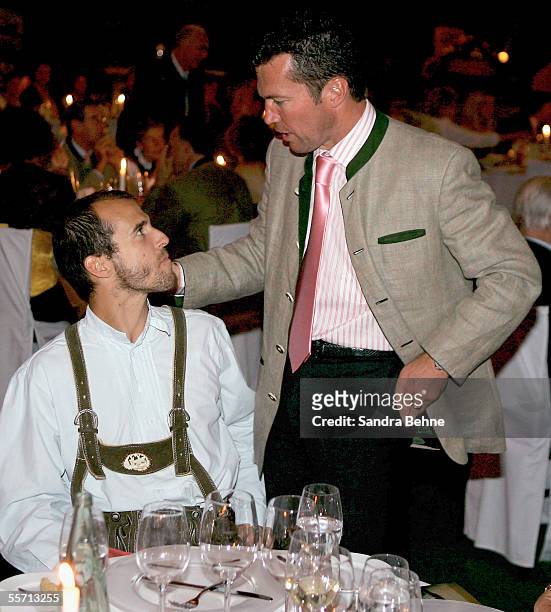 Mehmet Scholl talks with Lothar Matthaeus at the Arabella Sheraton Hotel on September 17, 2005 in Munich, Germany. German Bundesliga club Bayern...