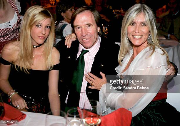 Guenter Netzer poses for a photo with his wife Elvira and his daughter Alana at the Arabella Sheraton Hotel on September 17, 2005 in Munich, Germany....