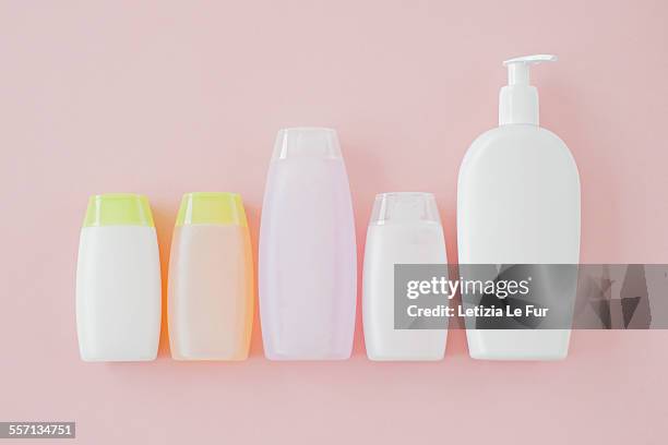bottles of cosmetics - shampoo stockfoto's en -beelden