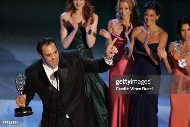 Actor Brad Garrett accepts the award for Best Supporting Actor in a Comedy Series for "Everybody Love Raymond" onstage at the 57th Annual Emmy Awards...