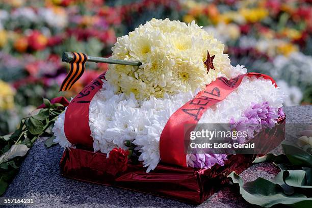 Riga - Latvia 10 May 2015 : A miniature model of a Soviet tank made of flowers at the Soviet victory monument in Riga Latvia marking 70 years since...