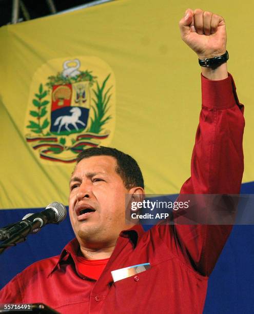Venezuelan President Hugo Chavez gestures during a speech in front of Miraflores presidential palace in Caracas 18 September 2005, on his return from...