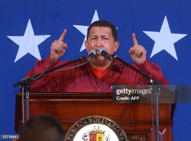 Venezuelan President Hugo Chavez gives a speech in front of Miraflores presidential palace in Caracas 18 September 2005, on his return from the UN...