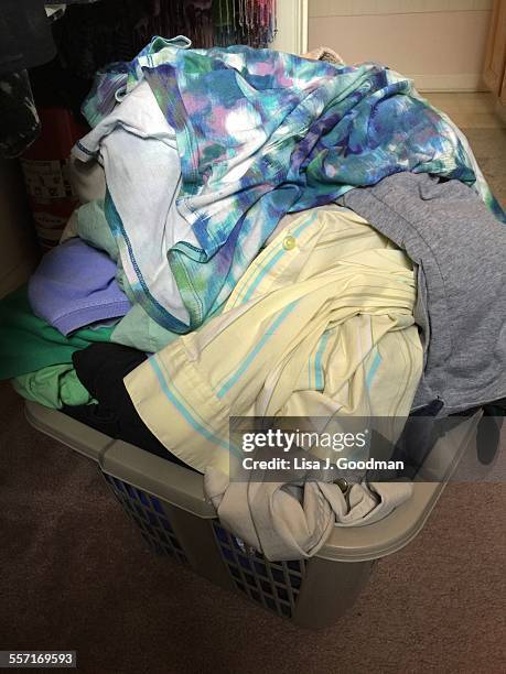 cleaning clothes  - overflowing closet stock pictures, royalty-free photos & images