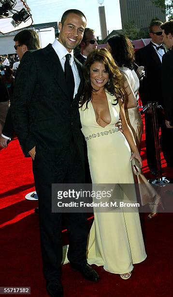 Personality Paula Abdul of FOX's nominated reality series "American Idol" and boyfriend, model Dante Spencer, arrive at the 57th Annual Emmy Awards...