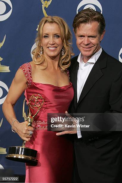 Actress Felicity Huffman poses with husband William H. Macy after winning Outstanding Lead Actress, Comedy in the press room at the 57th Annual Emmy...