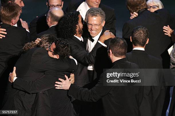 The Cast and Crew of "Lost" accepts the award for Outstanding Drama Series onstage at the 57th Annual Emmy Awards held at the Shrine Auditorium on...