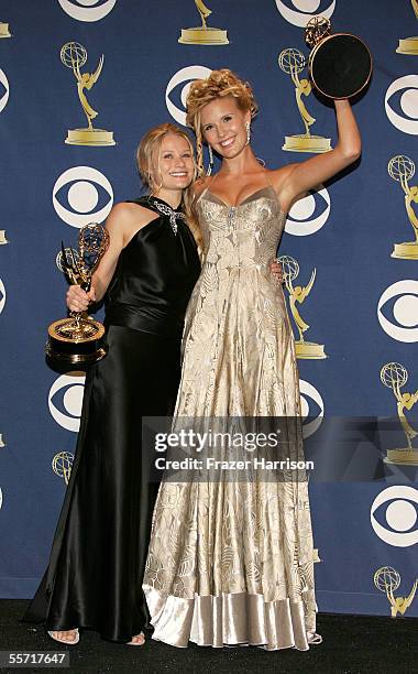 Lost' actresses Emilie de Ravin and Maggie Grace pose with the Emmy for Outstanding Drama Series in the press room at the 57th Annual Emmy Awards...