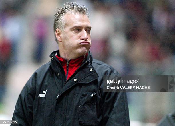 Picture taken 02 February 2005 at the Malherbe stadium in Caen, shows Monaco's coach Didier Deschamps reacting after losing the French League Cup...