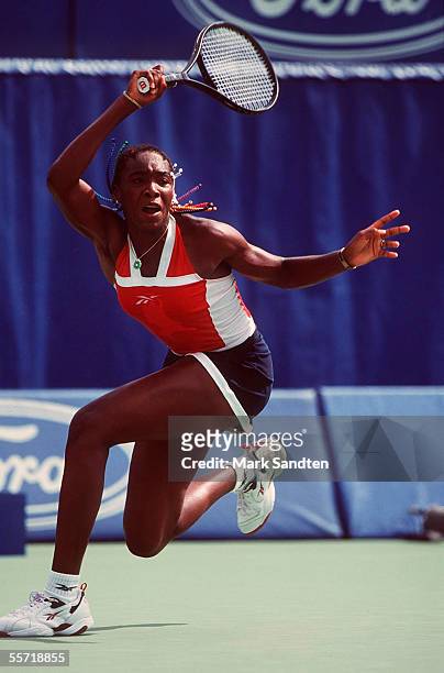 Venus WILLIAMS hits a forehand during her match of the Australian Open Grand Slam at Melbourne Park on January 14, 1999 in Melbourne, Australia.
