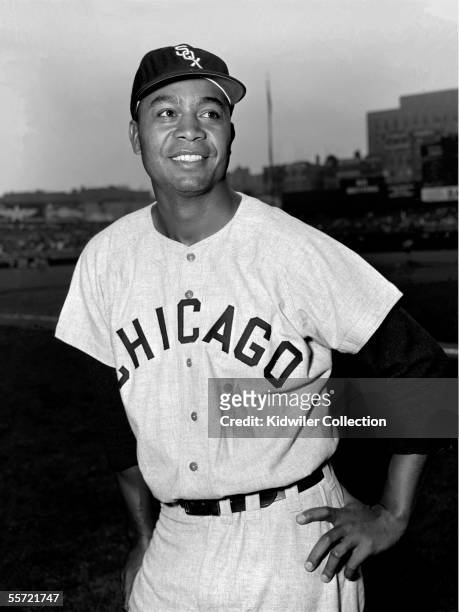 Outfielder Larry Doby, of the Chicago White Sox, poses for a portrait prior to a game in 1956 against the New York Yankees at Yankee Stadium in New...