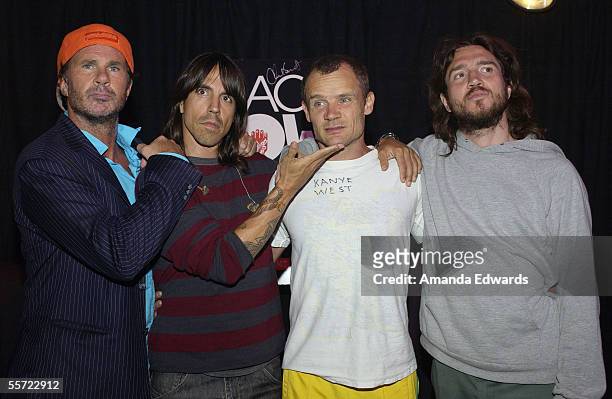The Red Hot Chili Peppers pose backstage at the "ReAct Now: Music & Relief" benefit concert at Paramount Studios on September 10, 2005 in Hollywood,...
