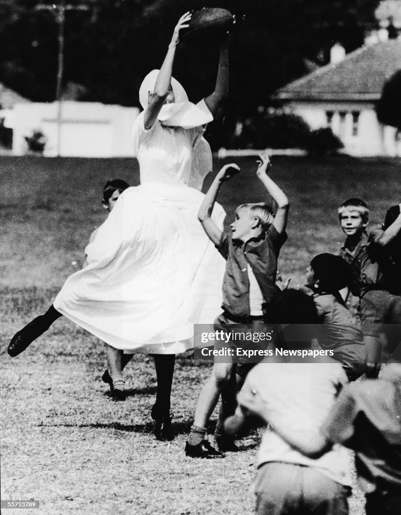 Nun Playing Rugby