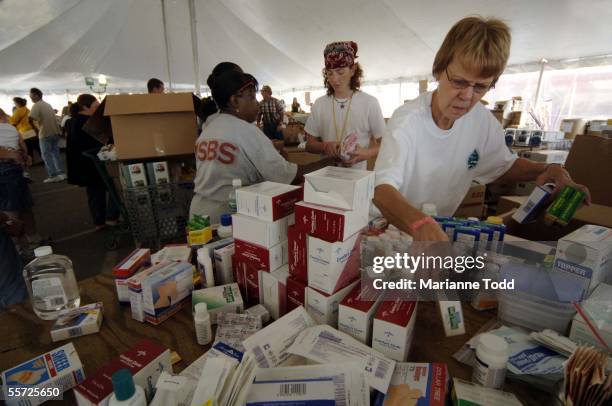 Mart parking lot is used to house a tent for Hurricane Katrina victims to shop for groceries and other items September 19, 2005 in Waveland,...