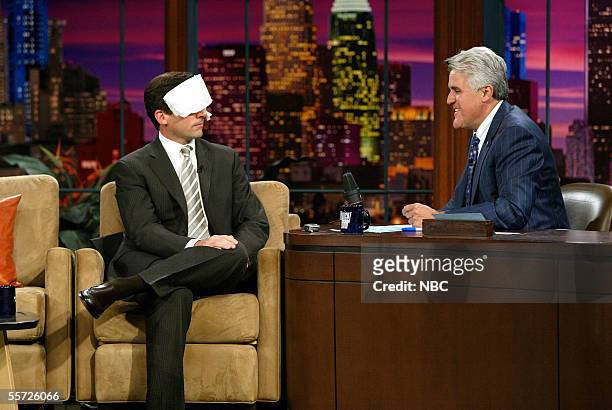 Actor Steve Carell jokes about sweating with "Tonight Show" host Jay Leno at NBC studios September 13, 2005 in Burbank, California.
