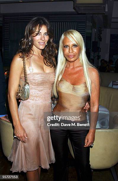 Elizabeth Hurley and Donatella Versace attend the afterparty dinner for the Versace London store relaunch, at Locatelli on September 19, 2005 in...