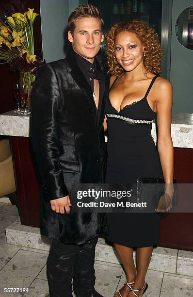 Lee Ryan and Aret Komlosy attend the afterparty dinner for the Versace London store relaunch, at Locatelli on September 19, 2005 in London, England.