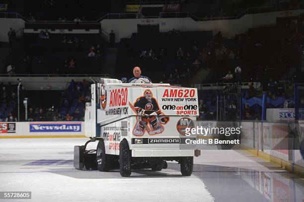 Driver rides an ice resurfacer advertising AM620 WJWR sports radio around the rink during downtime of an NY Islanders game at Nassau Coliseum,...