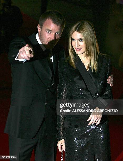 London, UNITED KINGDOM: Madonna and Guy Ritchie arrive at the UK premiere of gangster flick "Revolver" at the Odeon cinema in Leicester Square in...