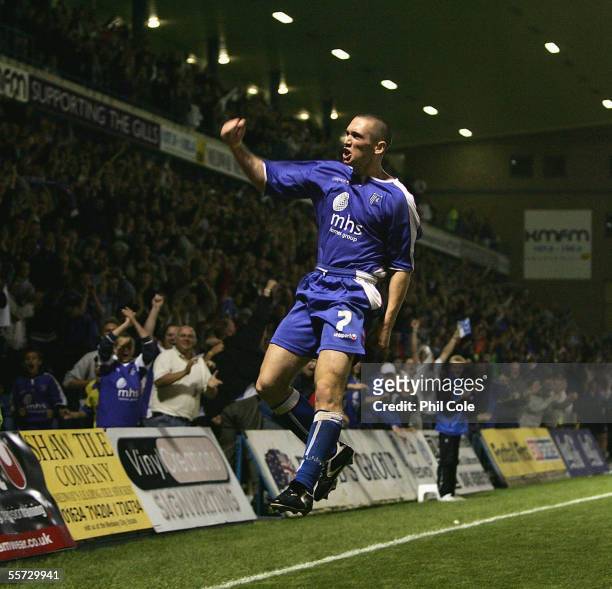 Andrew Crofts of Gillingham celebrates scoring during the Carling Cup second round match between Gillingham and Portsmouth at Priestfield Stadium on...