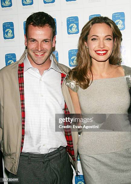 Actress Angelina Jolie and her ex-husband Jonny Lee Miller attend a special screening of the film "Peace One Day" at the Ziegfeld Theater September...