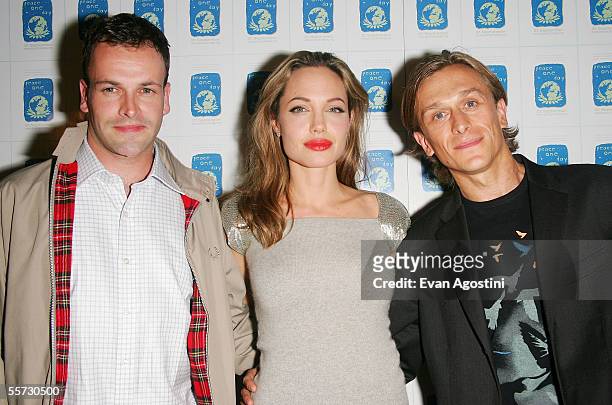 Actress Angelina Jolie, her ex-husband Jonny Lee Miller and filmmaker Jeremy Gilley attend a special screening of the film "Peace One Day" at the...