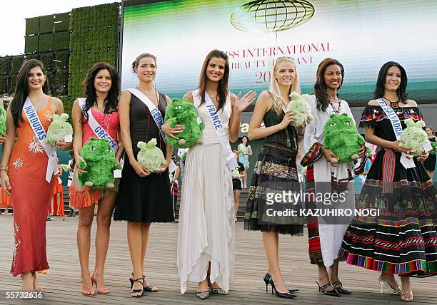 Candidates for the Miss International, L-R, Miss Honduras Ingrid Lopez, Miss Greece Panagiota Perimeni, Miss Germany Annika Pinther, Miss France...