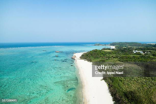 aerial view of tropical beach and clear blue water - satsunan islands fotografías e imágenes de stock