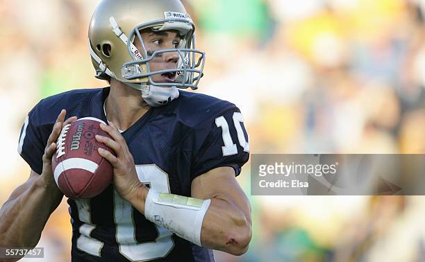 Brady Quinn of the Notre Dame Fighting Irish drops back to pass during the game with the Michigan State Spartans on September 17, 2005 at Notre Dame...