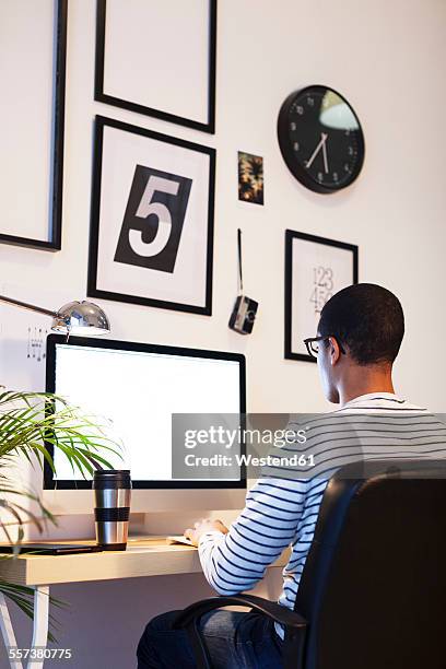 Black Man Behind Computer Photos and Premium High Res Pictures - Getty ...