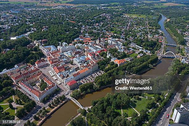 estonia, tartu, cityscape of old town with river emajogi - estonia stock-fotos und bilder