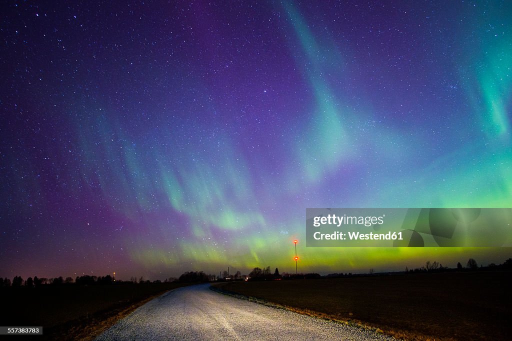 Estonia, Northern lights over empty road