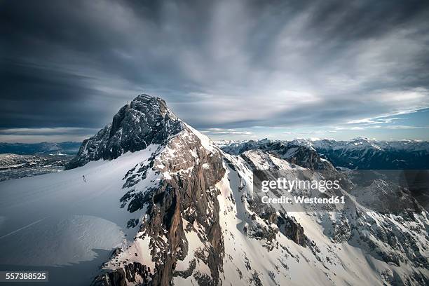 austria, schladming, dachstein mountains with south face of hunerkogel in the foreground - schladming austria stock-fotos und bilder