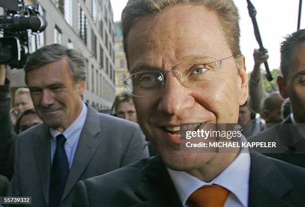 Guido Westerwelle , head of the Free Democrats , and his party's parliamentary fraction leader Wolfgang Gerhardt arrive on 22 September 2005 at the...