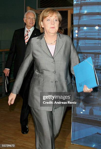 Angela Merkel, chancellor candidate of the Christian Democratic Union and Edmund Stoiber , governor of Bavaria and leader of the CSU, arrrive for a...