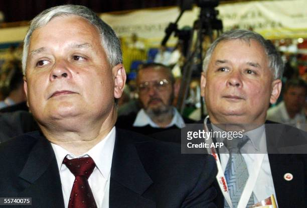 Twin brothers Lech and Jaroslaw Kaczynski from Catholic Law and Justice party are seen in Gdansk 31 August 2005. Lech Kaczynski is candidate in the...