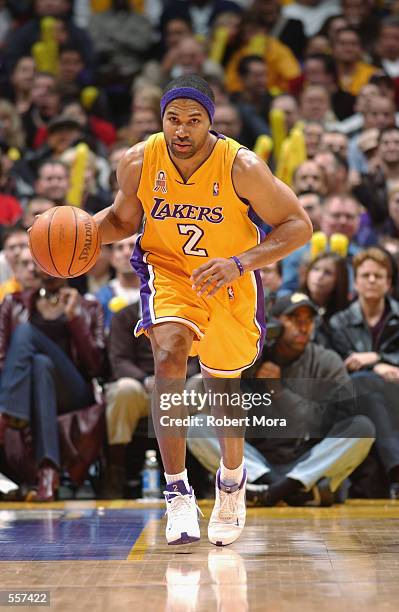 Point guard Derek Fisher of the Los Angeles Lakers dribbles the ball during the NBA game against the Los Angeles Clippers at Staples Center in Los...