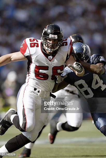Keith Brooking of the Atlanta Falcons move into position against the Seattle Seahawks during a game at Qwest Field on September 18, 2005 in Seattle,...
