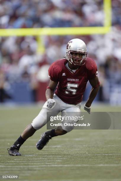 Wide receiver Michael Bumpus of the Washington State University Cougars runs on the field during a NCAA game against the Grambling State University...