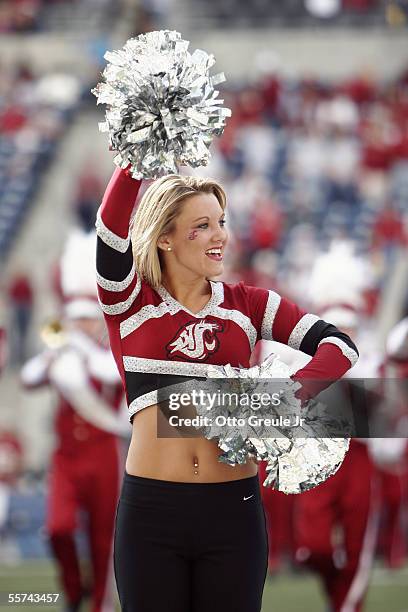 Washington State University Cougars cheerleader entertains the fans during a NCAA game against the Grambling State University Tigers at Quest Field...