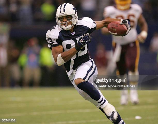 Wide receiver Terry Glenn of the Dallas Cowboys runs for yards after the catch against the Washington Redskins on September 19, 2005 at Texas Stadium...