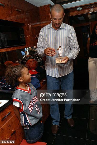 Jason Kidd visits with first grader Angelique Allen at her house before attending class with her at Tamaques Elementary School on September 23, 2005...