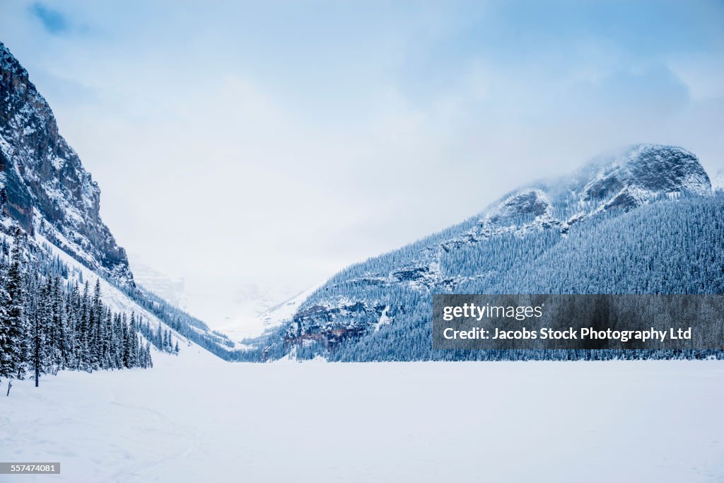 Snowy mountains in remote landscape, Lake Louise, Alberta, Canada