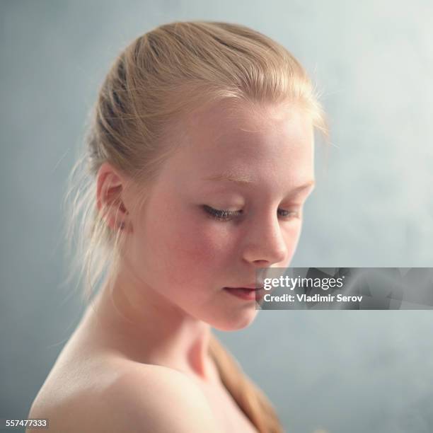 caucasian girl looking down - 15 years girl bare stock pictures, royalty-free photos & images