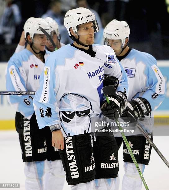 Players of Hamburg are dejected because of loosing the DEL Ice Hockey match between the Hamburg Freezers and the Krefeld Pinguine at the Color Line...